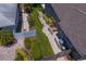Aerial view of backyard featuring landscaping design and patio at 80 Sycamore Ct, Palm Harbor, FL 34683