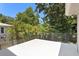 Wide angle shot from a spacious balcony overlooking vibrant green trees at 80 Sycamore Ct, Palm Harbor, FL 34683