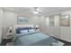A cozy bedroom featuring a comfortable bed, soft lighting, and tasteful decor for a relaxing retreat at 80 Sycamore Ct, Palm Harbor, FL 34683