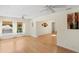 Spacious living area with hardwood floors, neutral walls, and plenty of natural light at 80 Sycamore Ct, Palm Harbor, FL 34683