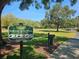 Westlake Village park entrance with signage indicating park rules and welcome message at 80 Sycamore Ct, Palm Harbor, FL 34683