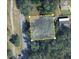 Aerial view of the property outlined in yellow at 8601 N 28Th St, Tampa, FL 33604