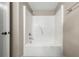 Bathroom featuring a shower and tub combination at 8805 Plum Grove Ct, Tampa, FL 33634