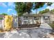 Charming single-story home with stone accents and well-maintained front yard landscaping at 8805 Plum Grove Ct, Tampa, FL 33634