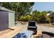 Backyard space with comfortable chairs and a fire pit at 945 8Th N St, St Petersburg, FL 33712