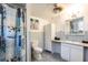 Bathroom with tile floors, bathtub, shower, and marine life decor at 945 8Th N St, St Petersburg, FL 33712