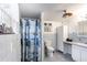 Bathroom with tile floors, bathtub, shower, and marine life decor at 945 8Th N St, St Petersburg, FL 33712