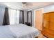 Cozy bedroom featuring hardwood floors, light blue walls and natural light at 945 8Th N St, St Petersburg, FL 33712