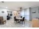 Bright dining area features a large window, seating for four, and easy access to the living room and other areas at 945 8Th N St, St Petersburg, FL 33712