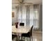 Well-lit dining room with a sleek table and modern decor at 945 8Th N St, St Petersburg, FL 33712