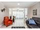 Open-concept living room with hardwood floors, comfortable seating, and seamless flow between spaces, creating a welcoming ambiance at 945 8Th N St, St Petersburg, FL 33712