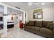 Cozy living room with a large sofa, decorative accents, and an open design, ideal for both lounging and socializing at 945 8Th N St, St Petersburg, FL 33712