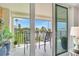 Balcony featuring seating and water views at 100 Oakmont Ln # 310, Belleair, FL 33756