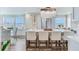Bright and airy kitchen with island seating, modern appliances, and stylish decor, perfect for entertaining at 100 Oakmont Ln # 310, Belleair, FL 33756