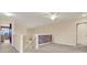 Loft area with open staircase, stylish railing, and neutral color scheme at 10106 Count Fleet Dr, Ruskin, FL 33575
