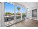 Bright, airy balcony with stunning views, accessed through sliding glass doors, offering outdoor living at 10216 Regal Dr # 208, Largo, FL 33774