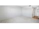 Bright bedroom featuring neutral walls, carpet flooring, and an attached bath for a clean, inviting space at 10216 Regal Dr # 208, Largo, FL 33774