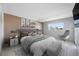 Serene main bedroom with soft textures and serene views of the neighborhood at 10216 Regal Dr # 208, Largo, FL 33774