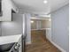 The kitchen provides stainless appliances and views of the expansive living space at 10216 Regal Dr # 208, Largo, FL 33774