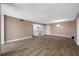 Inviting open-concept living space featuring modern flooring, neutral tones and ample natural light at 10216 Regal Dr # 208, Largo, FL 33774