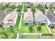 Beautiful aerial view of neighborhood showcasing the home's landscaping and location at 1028 Oliveto Verdi Ct, Brandon, FL 33511