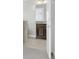 Bathroom featuring a dark vanity with a granite countertop and a white door at 1028 Oliveto Verdi Ct, Brandon, FL 33511