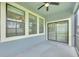 Relax on this covered patio, perfect for outdoor dining and entertaining at 1028 Oliveto Verdi Ct, Brandon, FL 33511