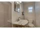Bathroom featuring a vessel sink, tiled shower, and modern design at 11188 64Th Ter, Seminole, FL 33772