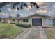 Charming single-story home with a well-maintained lawn, attached garage, and appealing curb appeal at 11188 64Th Ter, Seminole, FL 33772