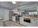A beautifully remodeled kitchen features stainless steel appliances and modern finishes at 11188 64Th Ter, Seminole, FL 33772