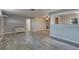 Inviting living room showcases sleek wood-look flooring and a neutral color palette at 11188 64Th Ter, Seminole, FL 33772