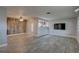 Spacious living room offers wood-look floors and an open layout to the kitchen at 11188 64Th Ter, Seminole, FL 33772