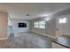 Open living room featuring wood-look floors, recessed lighting, and a contemporary aesthetic at 11188 64Th Ter, Seminole, FL 33772