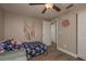 Comfortable bedroom with a bed, cieling fan, and a nearby closet at 11991 104Th Ave, Seminole, FL 33778