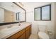 Bright bathroom with a large vanity and tile flooring offers a functional space to get ready in comfort at 12780 N 57Th St, Tampa, FL 33617