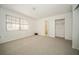 A bright bedroom boasts a window and closet, providing ample storage and natural light at 12780 N 57Th St, Tampa, FL 33617