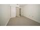 Clean bedroom with neutral carpet and closet space provides a blank canvas to create your personal space at 12780 N 57Th St, Tampa, FL 33617