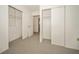 Walk-in closets include built-in shelving and rods for organization and storage in the bedroom at 12780 N 57Th St, Tampa, FL 33617