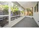 Relaxing screened patio with a stone path and privacy from lush greenery at 12780 N 57Th St, Tampa, FL 33617
