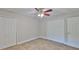 Bedroom features a ceiling fan, tile flooring, and closet at 13125 Wilcox Rd # 16202, Largo, FL 33774
