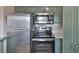 Kitchen with modern stainless steel appliances and updated countertops at 13125 Wilcox Rd # 16202, Largo, FL 33774