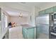 Eat in kitchen features stainless steel appliances and a breakfast bar at 13125 Wilcox Rd # 16202, Largo, FL 33774