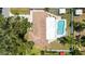 Aerial view of the property showing the layout, roof, and pool at 1530 Picardy Cir, Clearwater, FL 33755