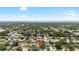 Neighborhood aerial view showcases proximity to water and the surrounding area at 1530 Picardy Cir, Clearwater, FL 33755