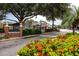 Charming street view in Dunedin, showcasing local businesses, lush landscaping, and a welcoming atmosphere at 1573 Cumberland Ln, Clearwater, FL 33755