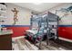 Colorful bedroom with bunk beds and superhero decor at 1844 Odiorne Point Ln, Wesley Chapel, FL 33543