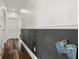Hallway with dark trim, and gray accent wall at 1844 Odiorne Point Ln, Wesley Chapel, FL 33543