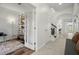 Bright hallway leading to living spaces, with tile flooring and natural light at 1844 Odiorne Point Ln, Wesley Chapel, FL 33543