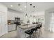 Bright kitchen with stainless steel appliances and granite countertops at 1844 Odiorne Point Ln, Wesley Chapel, FL 33543