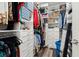 Custom walk-in closet with built-in shelving, drawers, and ample storage space at 1844 Odiorne Point Ln, Wesley Chapel, FL 33543
